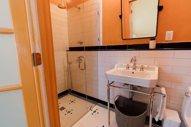 115 Rte 28, West Harwich, MA 02671 - bathroom with a sink, tile walls, wainscoting, and a shower stall