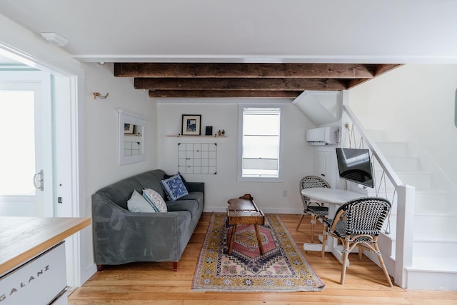 115 Rte 28, West Harwich, MA 02671 - living room featuring beamed ceiling, baseboards, and light wood-style floors