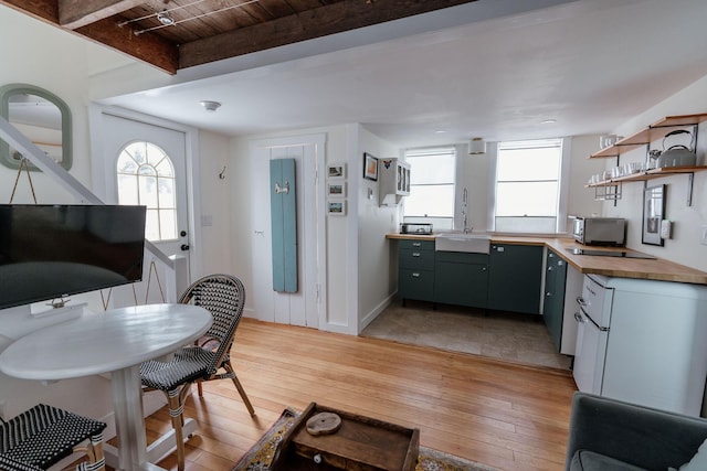 115 Rte 28, West Harwich, MA 02671 - kitchen featuring a sink, wooden counters, a healthy amount of sunlight, and light wood-style flooring