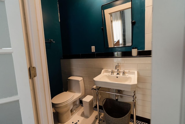 115 Rte 28, West Harwich, MA 02671 - half bath featuring tile walls, toilet, and a sink