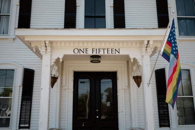 entrance to property featuring a balcony