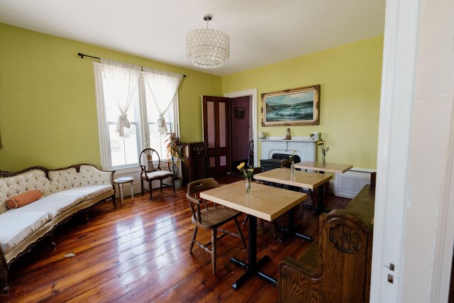 115 Rte 28, West Harwich, MA 02671 - office area with a chandelier, a fireplace, and wood-type flooring