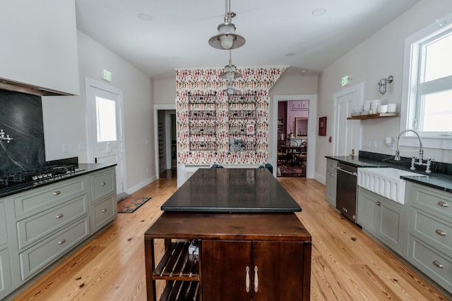 115 Rte 28, West Harwich, MA 02671 - kitchen with a sink, decorative backsplash, dark countertops, and black gas cooktop
