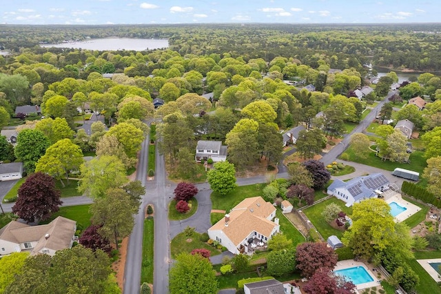 8 Viking Rock Rd, South Yarmouth, MA 02664 - aerial perspective of suburban area with a pool area, a large body of water, and a heavily wooded area