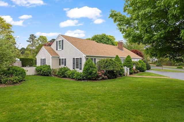 8 Viking Rock Rd, South Yarmouth, MA 02664 - cape cod-style house with a chimney and roof with shingles