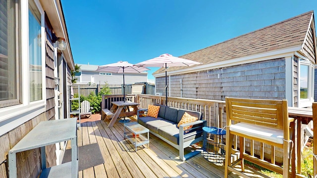 deck with an outdoor hangout area