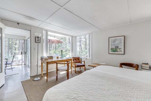 bedroom featuring multiple windows