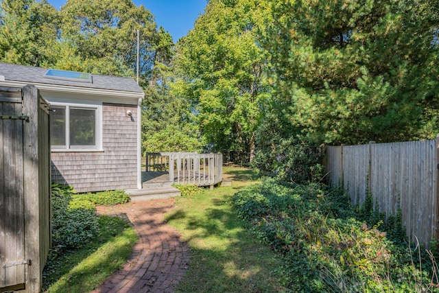 view of yard with a deck