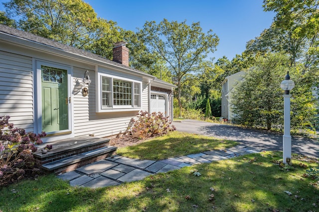 view of yard featuring a garage