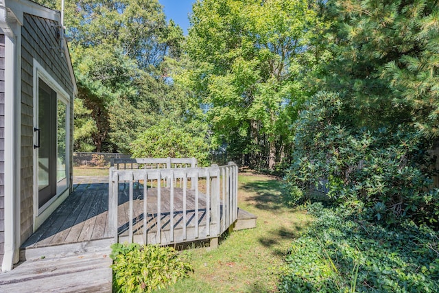 deck featuring a yard