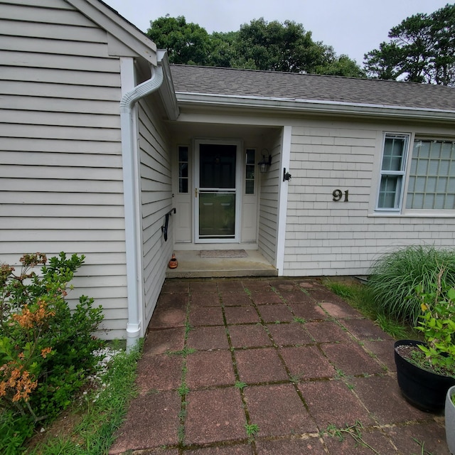 property entrance with a patio