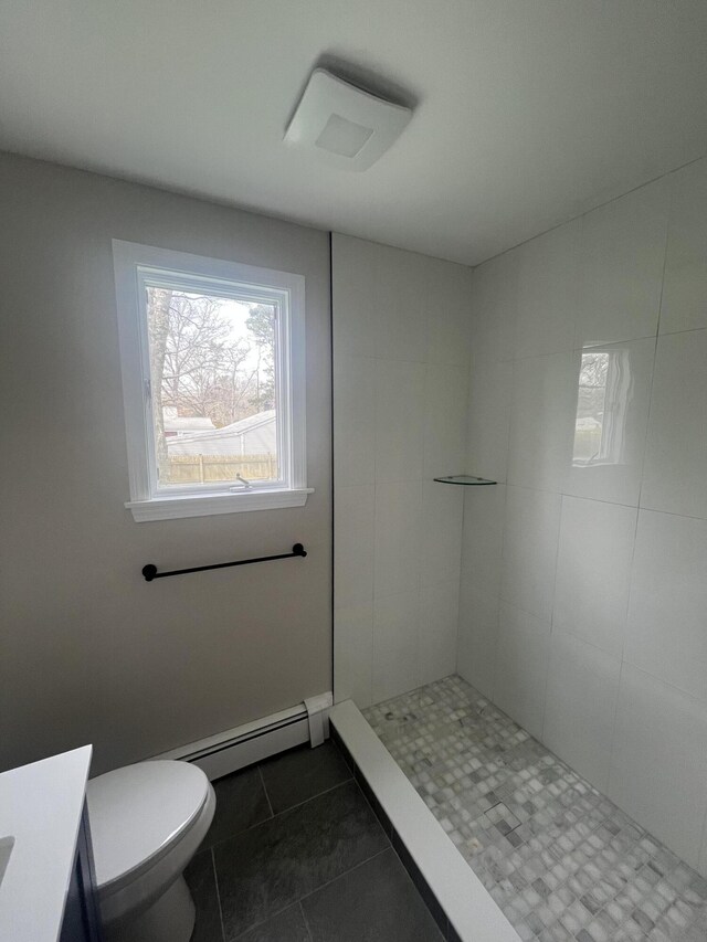 23 Town Hall Ave, South Yarmouth, MA 02664 - full bath featuring a baseboard heating unit, tile patterned floors, tiled shower, toilet, and vanity
