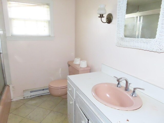full bathroom featuring tile patterned flooring, a baseboard radiator, toilet, and vanity