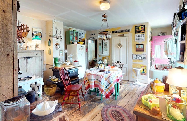 dining space with light wood-type flooring