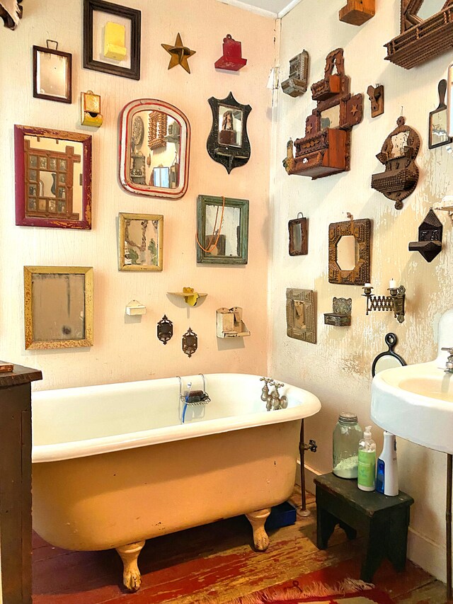 bathroom featuring a tub to relax in