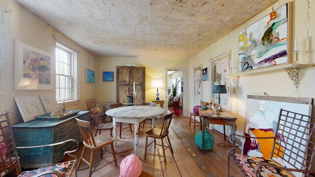 dining room with hardwood / wood-style floors