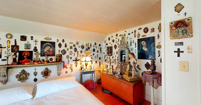 bedroom featuring vaulted ceiling