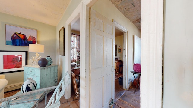 hallway with a baseboard radiator