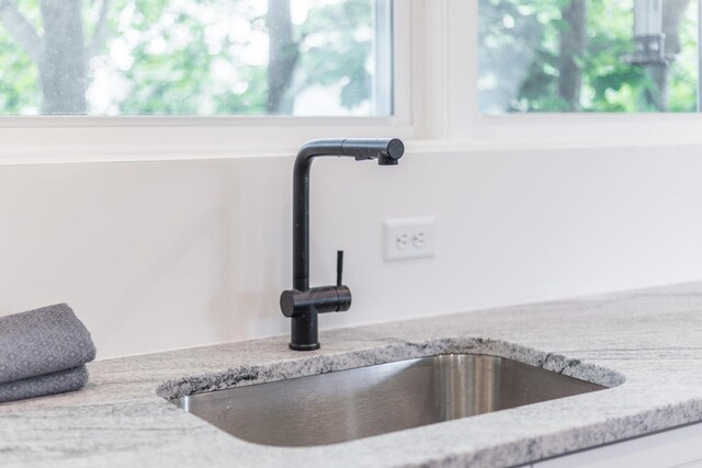36 Pearl St Unit 3, Provincetown, MA 02657 - detailed view of a sink and light stone counters