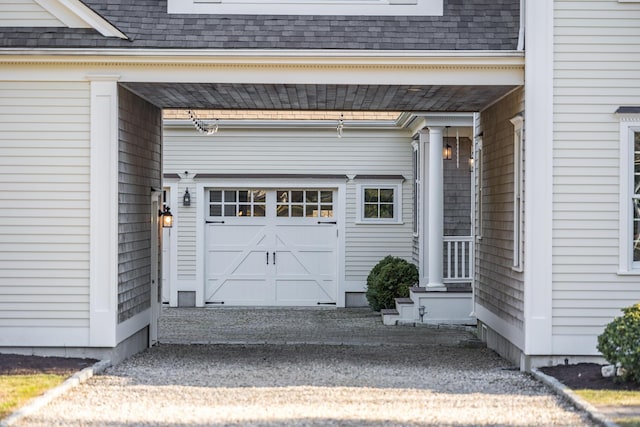 garage featuring a carport