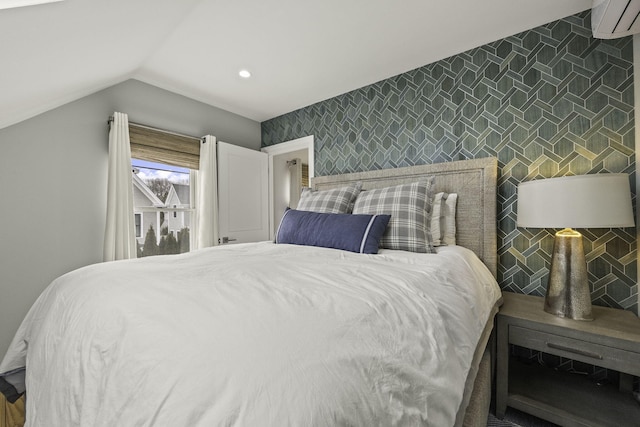 bedroom with lofted ceiling