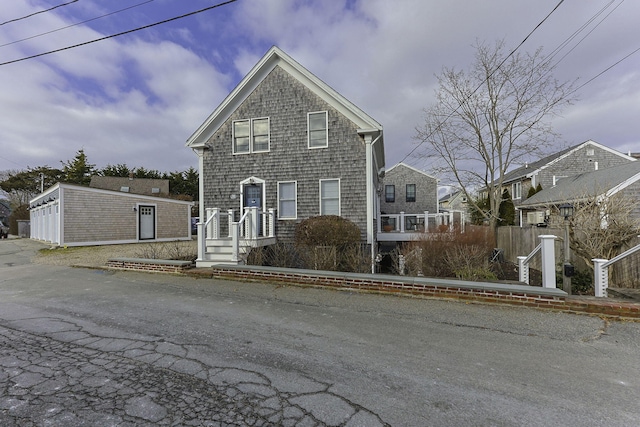 front facade featuring an outbuilding