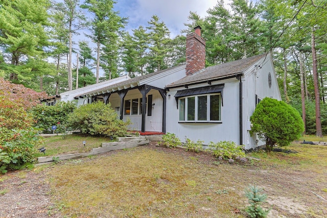 28 Brook St, Plympton, MA 02367 - view of front facade featuring a chimney