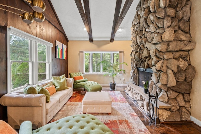 28 Brook St, Plympton, MA 02367 - living room with wood finished floors, baseboards, and a stone fireplace