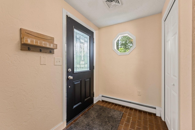 28 Brook St, Plympton, MA 02367 - doorway to outside featuring baseboard heating, baseboards, and a textured wall
