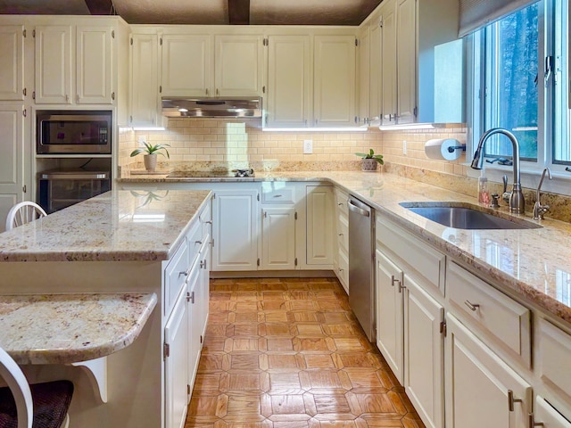 28 Brook St, Plympton, MA 02367 - kitchen featuring appliances with stainless steel finishes, plenty of natural light, a sink, and white cabinets