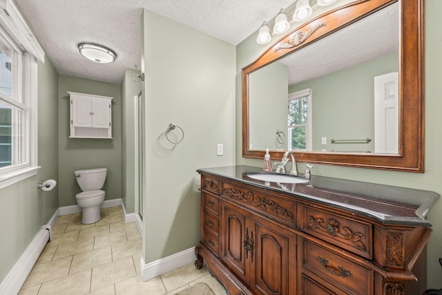 28 Brook St, Plympton, MA 02367 - full bathroom with a baseboard radiator, vanity, toilet, a textured ceiling, and tile patterned floors