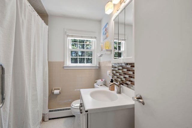 64 Gold Finch Ln, South Dennis, MA 02660 - bathroom featuring toilet, a shower with shower curtain, tile walls, a baseboard heating unit, and vanity