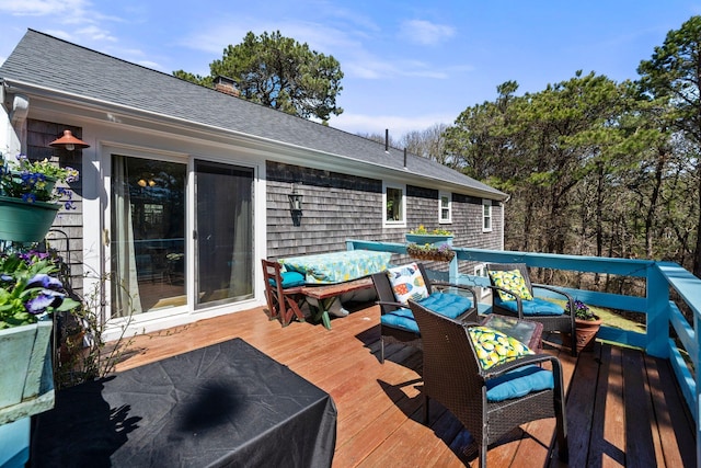 64 Gold Finch Ln, South Dennis, MA 02660 - wooden deck featuring outdoor dining space and an outdoor living space