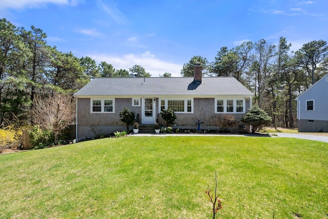 64 Gold Finch Ln, South Dennis, MA 02660 - ranch-style house featuring a front yard, a chimney, and entry steps