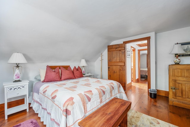 181 Stony Brook Rd, Brewster, MA 02631 - bedroom featuring hardwood / wood-style flooring and vaulted ceiling