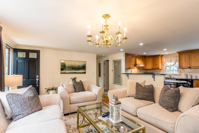 15 Mirror Brook Rd, West Yarmouth, MA 02673 - living room with a chandelier, recessed lighting, and light wood-style flooring