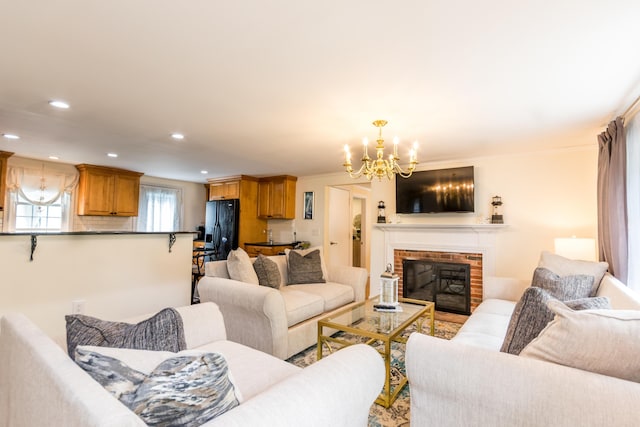 15 Mirror Brook Rd, West Yarmouth, MA 02673 - living area featuring a chandelier, a fireplace, and recessed lighting
