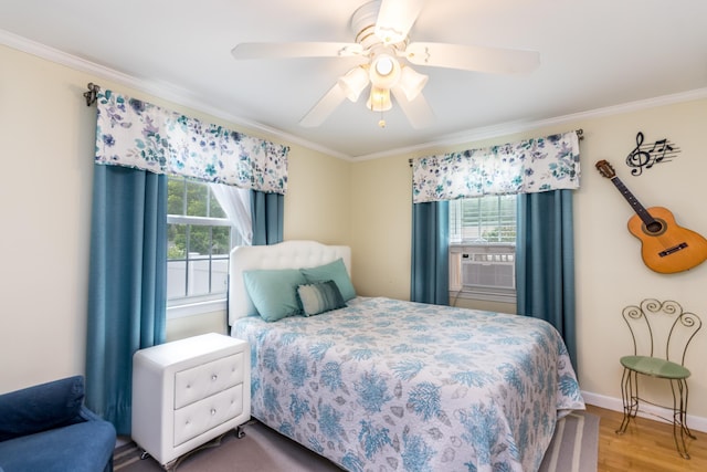 15 Mirror Brook Rd, West Yarmouth, MA 02673 - bedroom with multiple windows, ornamental molding, wood finished floors, a ceiling fan, and cooling unit