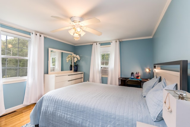 15 Mirror Brook Rd, West Yarmouth, MA 02673 - bedroom with crown molding, light wood-style floors, and ceiling fan