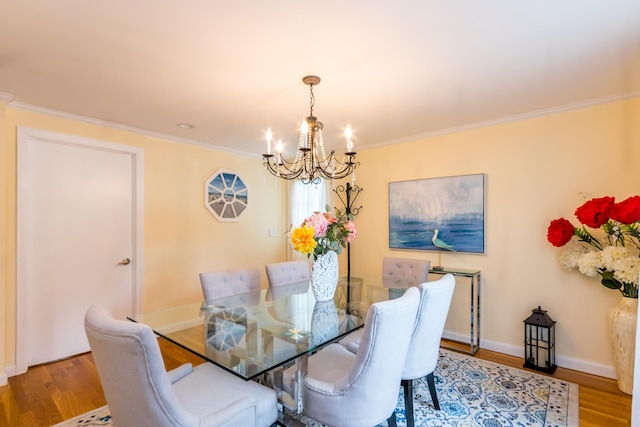 15 Mirror Brook Rd, West Yarmouth, MA 02673 - dining area featuring a chandelier, wood finished floors, and crown molding