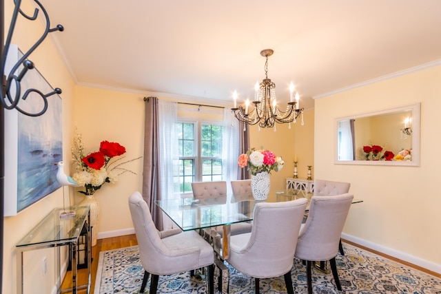 15 Mirror Brook Rd, West Yarmouth, MA 02673 - dining room with a chandelier, crown molding, and wood finished floors