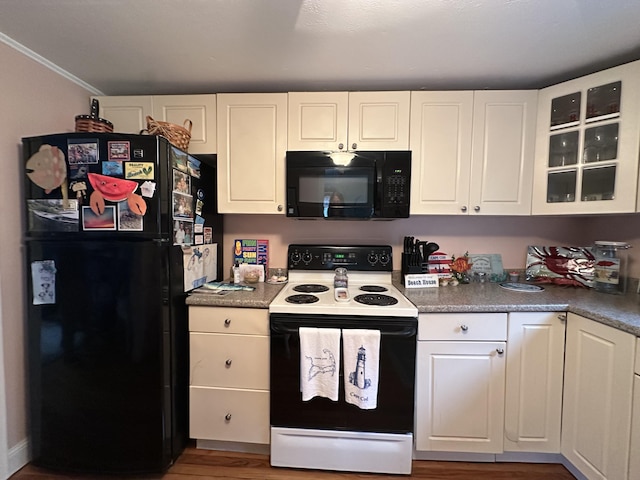 39 Naushon Rd, Dennis Port, MA 02639 - kitchen featuring glass insert cabinets, crown molding, wood finished floors, black appliances, and white cabinets
