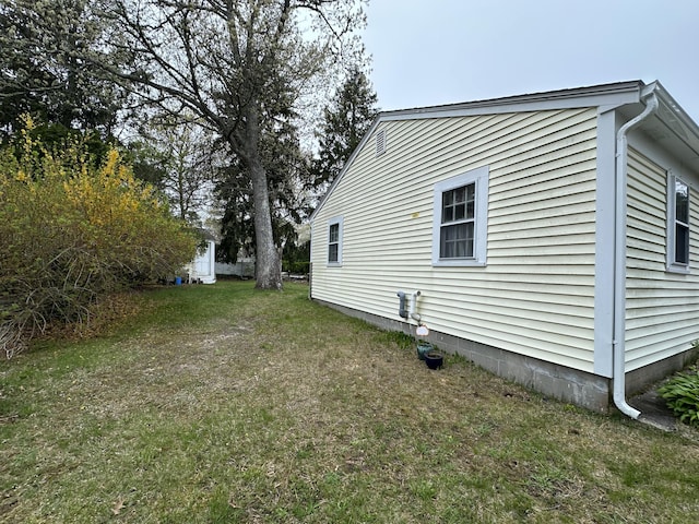 39 Naushon Rd, Dennis Port, MA 02639 - view of side of home featuring a lawn