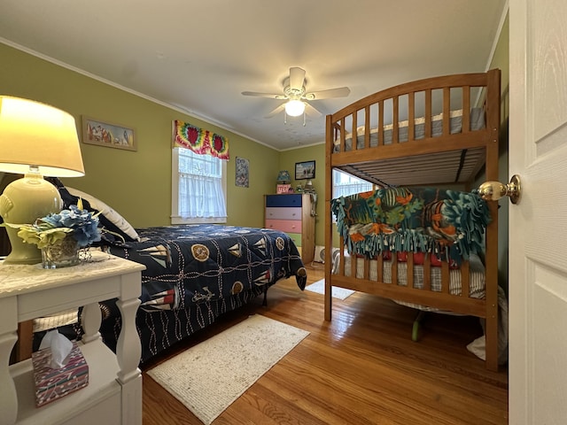 39 Naushon Rd, Dennis Port, MA 02639 - bedroom with ornamental molding, a ceiling fan, and wood finished floors