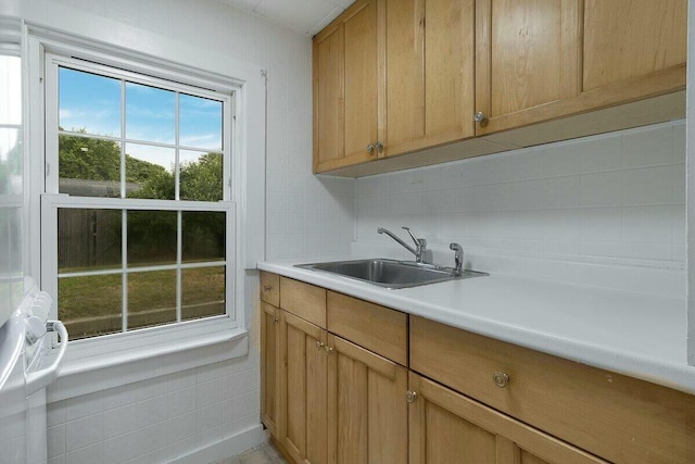 kitchen with sink and backsplash