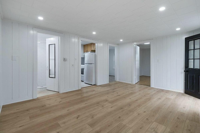 unfurnished living room with light wood-type flooring