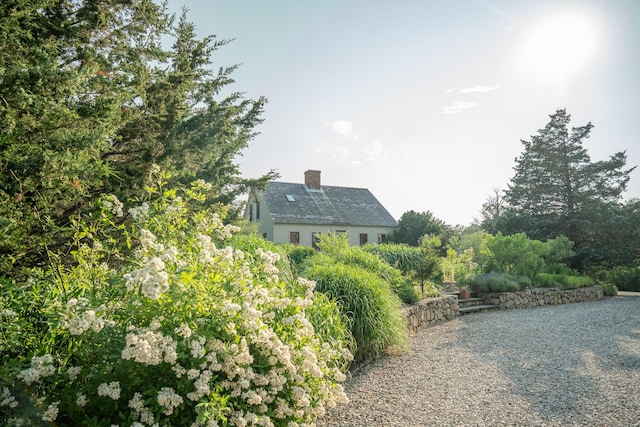 625 Bridge Rd, Eastham, MA 02642 - view of side of home featuring a chimney
