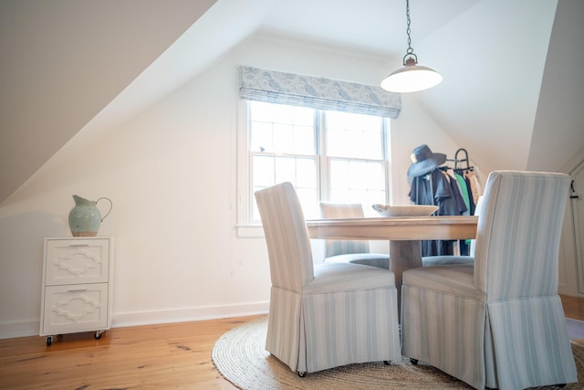 625 Bridge Rd, Eastham, MA 02642 - dining space with vaulted ceiling and wood finished floors