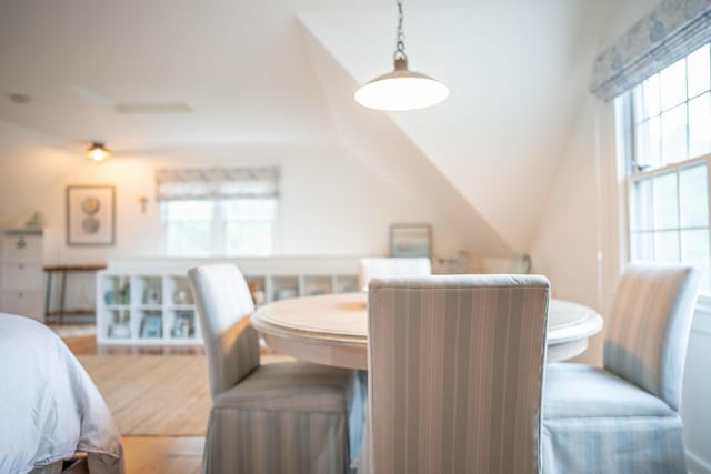 625 Bridge Rd, Eastham, MA 02642 - dining room featuring plenty of natural light, lofted ceiling, and wood finished floors