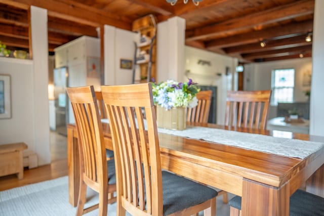 625 Bridge Rd, Eastham, MA 02642 - dining space with a wood ceiling with exposed beams and wood finished floors